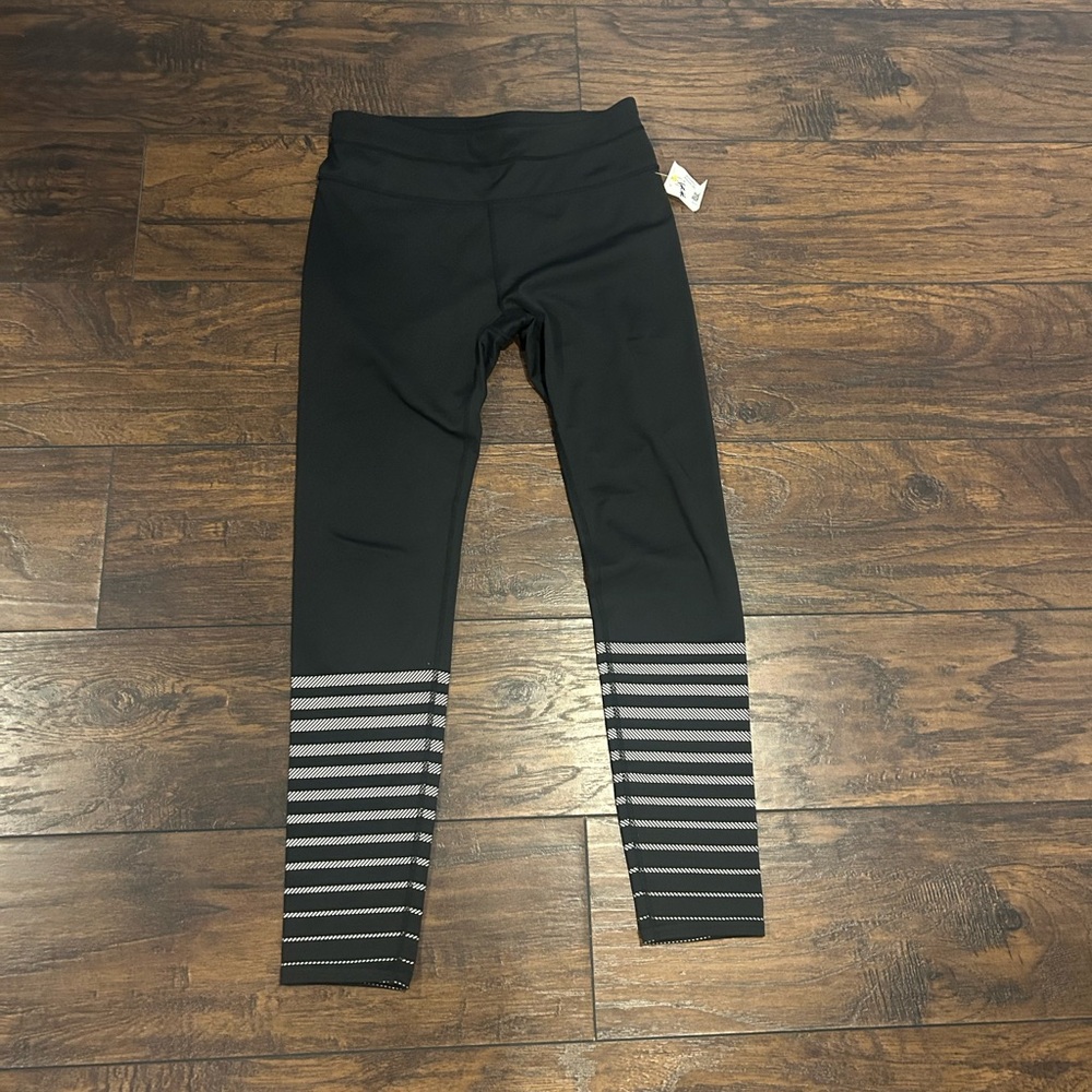 Athleta Black Leggings with white Stripes Gently Used
